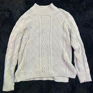 Oversized cable knit mock neck sweater